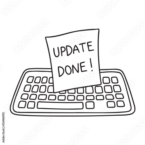 A note with update done stuck to a keyboard key
