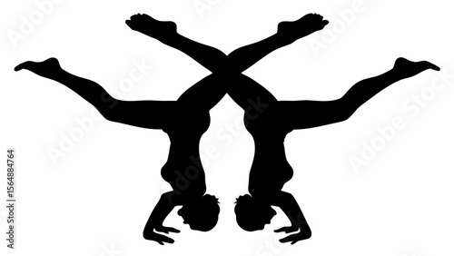 Silhouette of two women performing handstands with legs crossed in a mirrored symmetrical composition