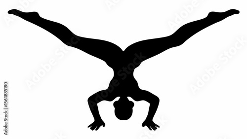 Silhouette of a person doing a handstand with legs spread wide and arms bent in a yoga position