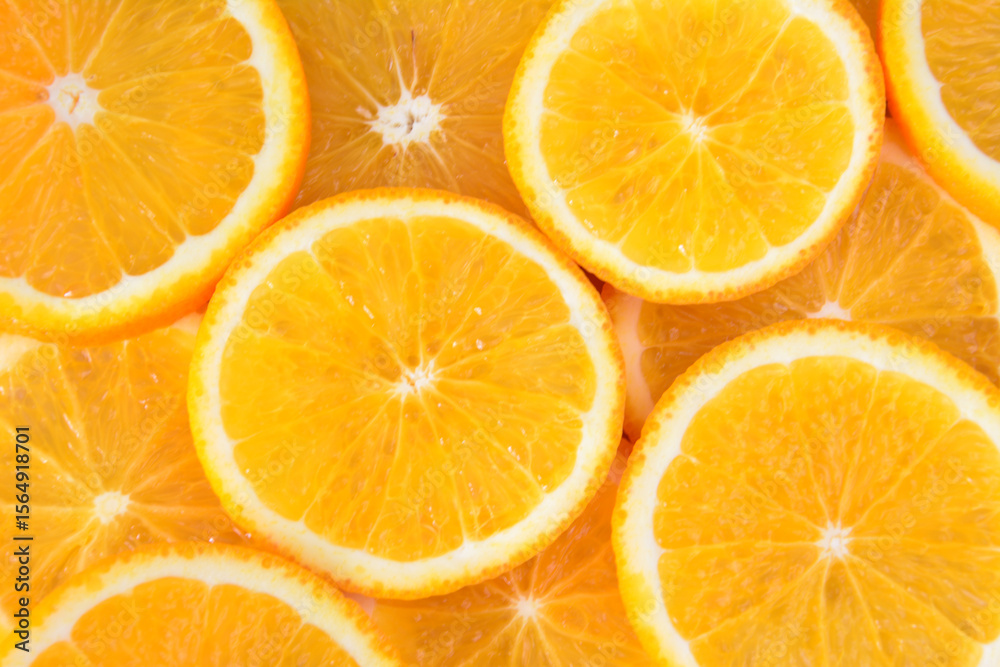Close-up of fresh orange slices orange background Close-up of fresh orange slices orange background