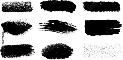 Distressed monochrome ink patches for artistic design and texture effects