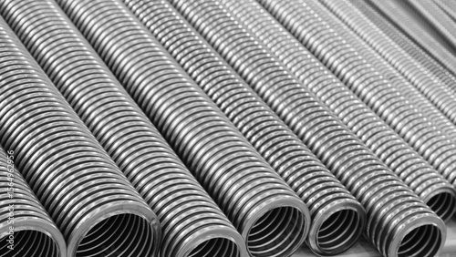 Wallpaper Mural Row of stainless steel corrugated high pressure pipes in silver color. pipes are long and thin. Mechanical industrial concept background blue tone. Torontodigital.ca