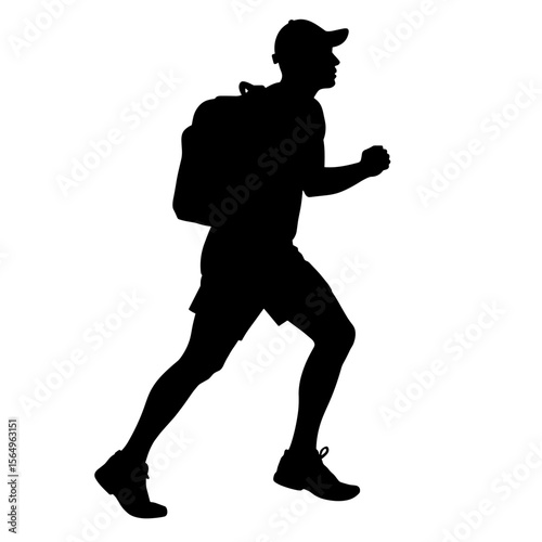 Silhouette of a hiker walking with a backpack outdoors  