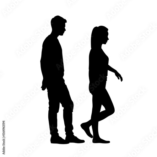 Silhouettes of a man and woman walking in opposite directions  