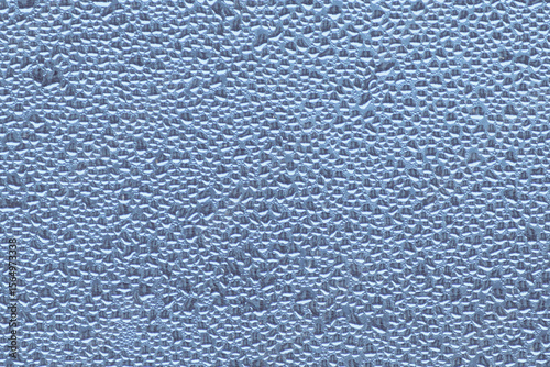 Glass is covered with many drops of water