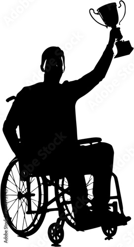 Young man in wheelchair holding winner trophy black silhouette.
