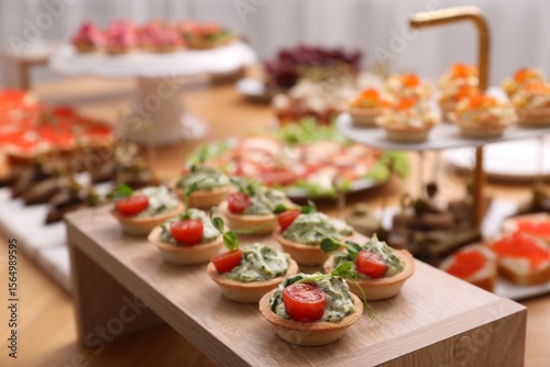 Billede på lærred Buffet menu. Many different appetizers on table, closeup