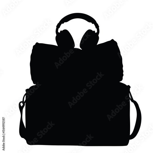 Silhouette of cabin bag with headphones, travel essentials onboard comfort