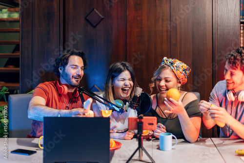 Content creators recording podcast or online show with fruits