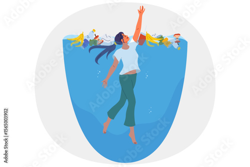 Woman floats in water among pile of garbage, suffering due to ocean pollution causing disruption to ecosystem. Ocean pollution needs fixing to combat climate change and microplastic poisoning animals