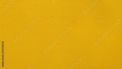Textured yellow wall with abstract close-up design