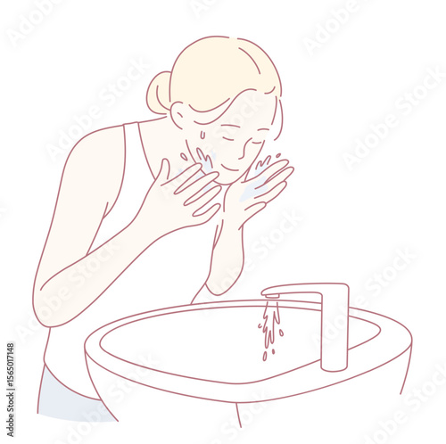 A woman is gently washing her face at a sink, beautifully showcasing a simple yet effective skincare routine
