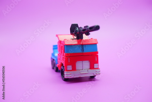 Transforming Truck Toy with Weapon Mounted on Roof