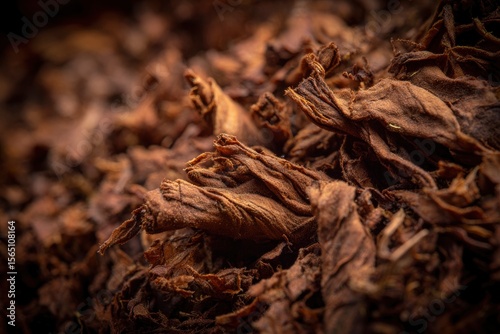 Closeup of dried crinkled tobacco leaves in shades of brown