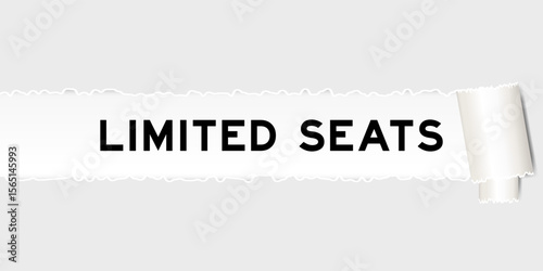 Ripped gray paper background that have word limited seats under torn part