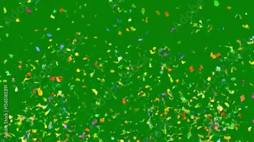 Colorful glitter confetti falling on green screen