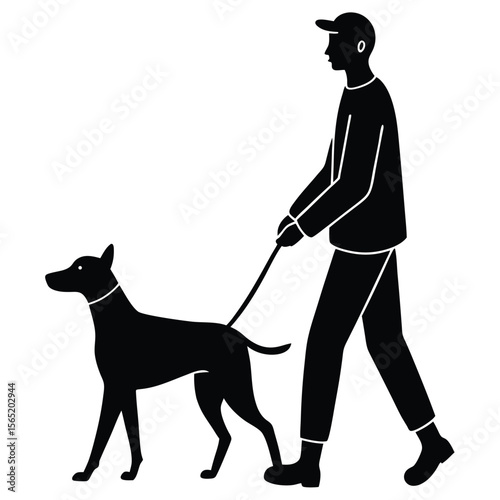 Man in a baseball cap walking a dog on a leash in silhouette