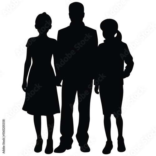 Silhouette of a father and his two daughters standing together