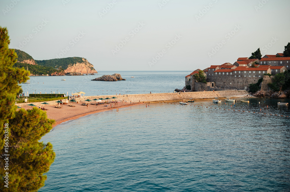Fototapeta premium Scenic Coastal View with Historic Buildings