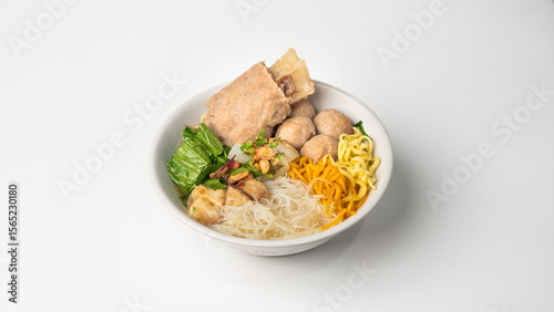 Indonesian Bakso: Savory Meatball and Noodle Soup with Fresh Toppings, Isolated on White Background