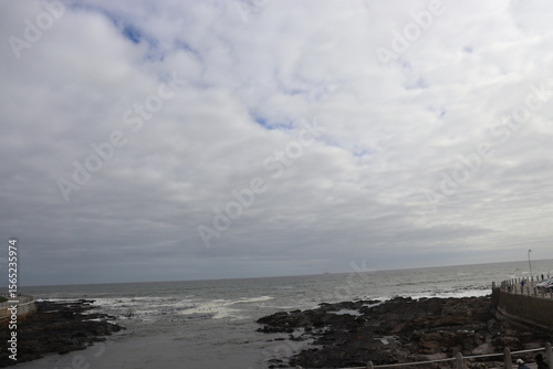 Coastal Horizon and Windy Ocean View with Dramatic Cloudy Sky