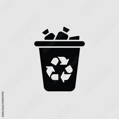 Recycle bin filled with waste icon
