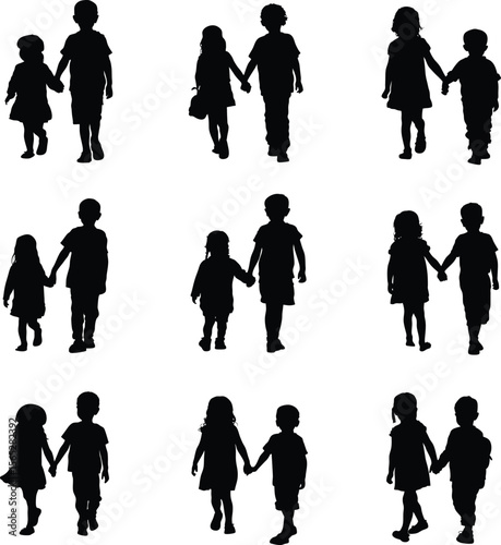 Collection of diverse silhouettes of children holding hands and walking