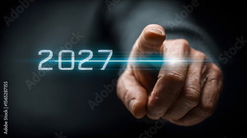 2027 Digital Future: Man Touching Futuristic Holographic Display