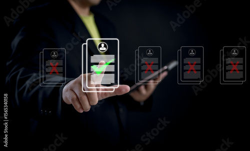 Businessman using digital interface to select candidate profile with green check mark among rejected resumes, symbolizing modern recruitment, hiring decision, and job application screening.