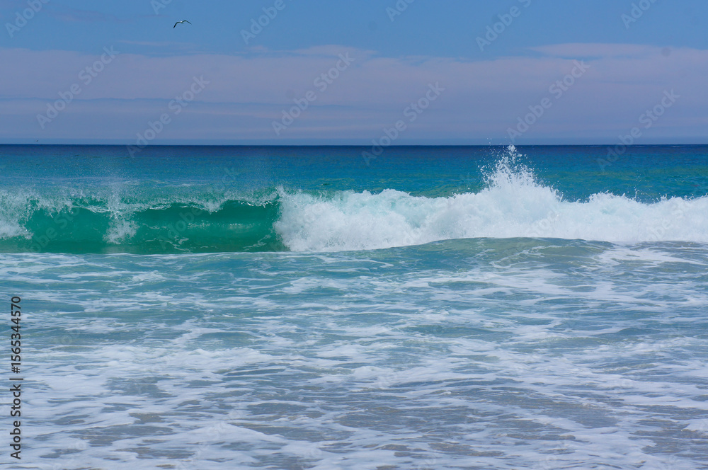 Fototapeta premium Evening Light Embracing the Tranquil Sea of Japan in Hues of Pink and Blue