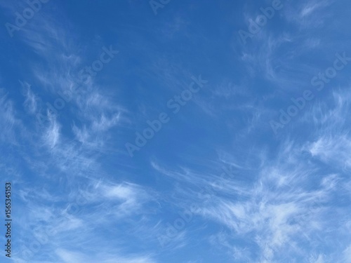 Canvas Print Cirrus clouds in blue sky.