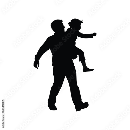 Silhouette of father giving his daughter a piggyback ride while walking