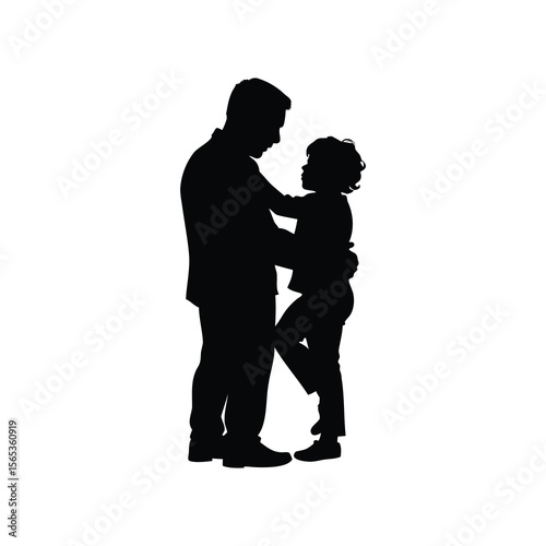 A tender moment captured in silhouette, father lovingly embraces his child