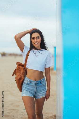 Young Woman Enjoying a Relaxing Day on the Beach
