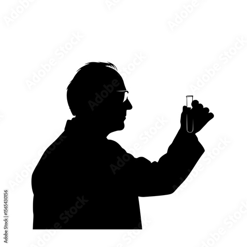 Silhouette of a scientist examining a test tube in a laboratory