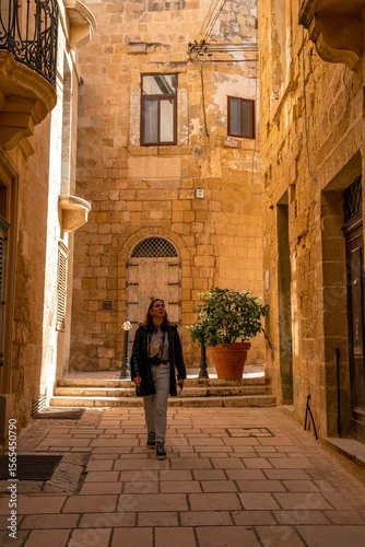 Historic alleyways of Malta sland with a girl
