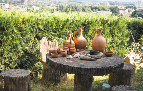 Georgia equipment set isolated on white background. Vector illustration of Georgian flag, grapes, bottles and glass with wine, jug, dagger, wine horn, pandura, hat in cartoon style.