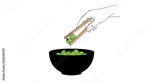 Hand using chopsticks to pick up olives from a bowl on white background, healthy snack concept