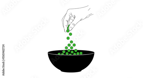 Hand sprinkling green peas into a black bowl on white background, healthy snacking concept