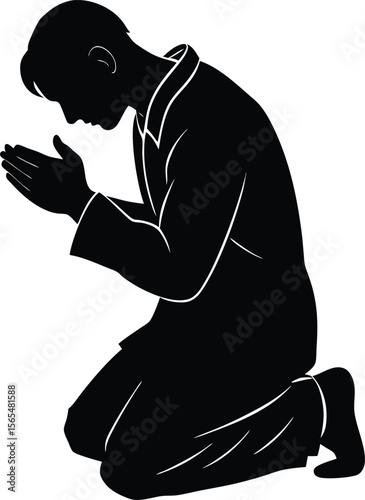 Silhouette of a man kneeling in prayer with hands clasped together