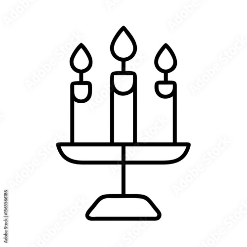 Three candles in a decorative candelabra for home decor and celebration