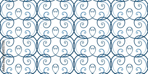 Seamless pattern of blue curls on white background. Frost pattern on the window. Ethnic folk ornament in nordic style. Monochrome ornamental background of swirls. Winter holiday decor.