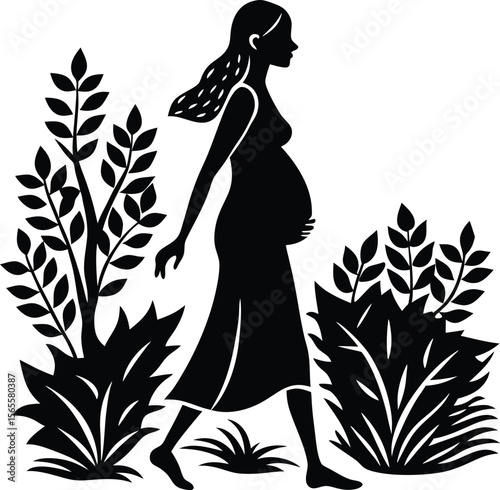 A pregnant silhouette of a woman takes a barefoot walk among leafy foliage