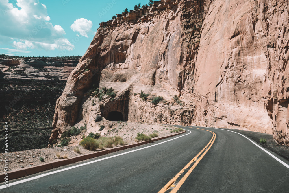 Driving through Colorado National Monument on a sunny day, near Grand Junction Driving through Colorado National Monument on a sunny day, near Grand Junction