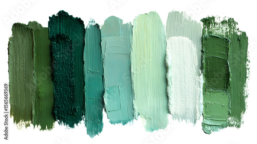 A collection of various shades of green paint swatches, ranging from deep forest green to pale mint.