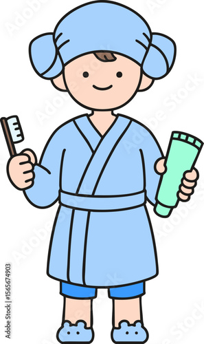 a boy in a bathrobe holding toothbrush toothpaste