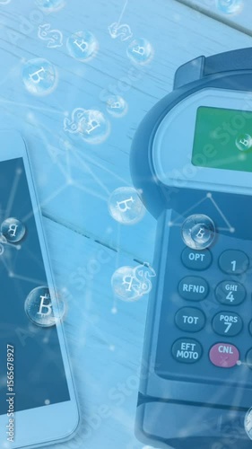 Animation of bitcoins over smartphone and payment terminal
