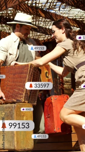 Social media notifications animation over couple carrying luggage on vacation