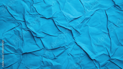 Wallpaper Mural Blue crumpled fabric texture with rough wrinkles and folds. Abstract background for design, web banner, or decorative element. Torontodigital.ca
