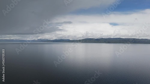 Zephyr Cove, Sunset Beach Grill & Bar South Lake Tahoe California cold May day with storm arriving bringing snow and freezing rain Drone footage